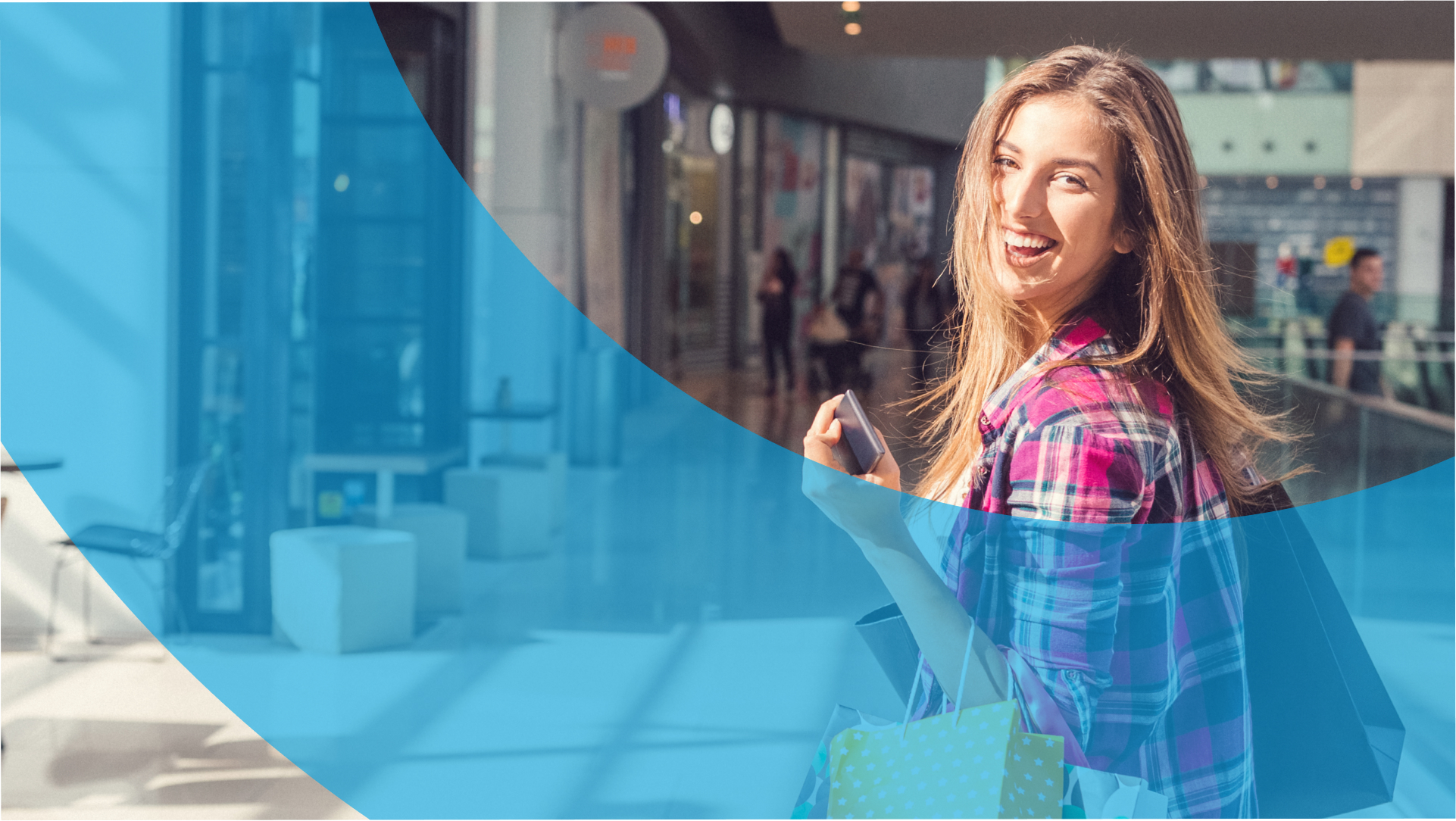 Young Woman Shopping Holding Bags and Mobile Phone