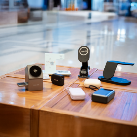 Variety of electricals sitting on wooden table