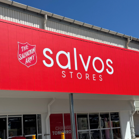 Shopfront displaying a red sign that says Salvos Stores